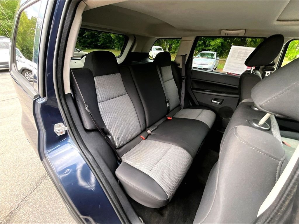 Used 2009 Modern Blue Pearlcoat Jeep Laredo image 16