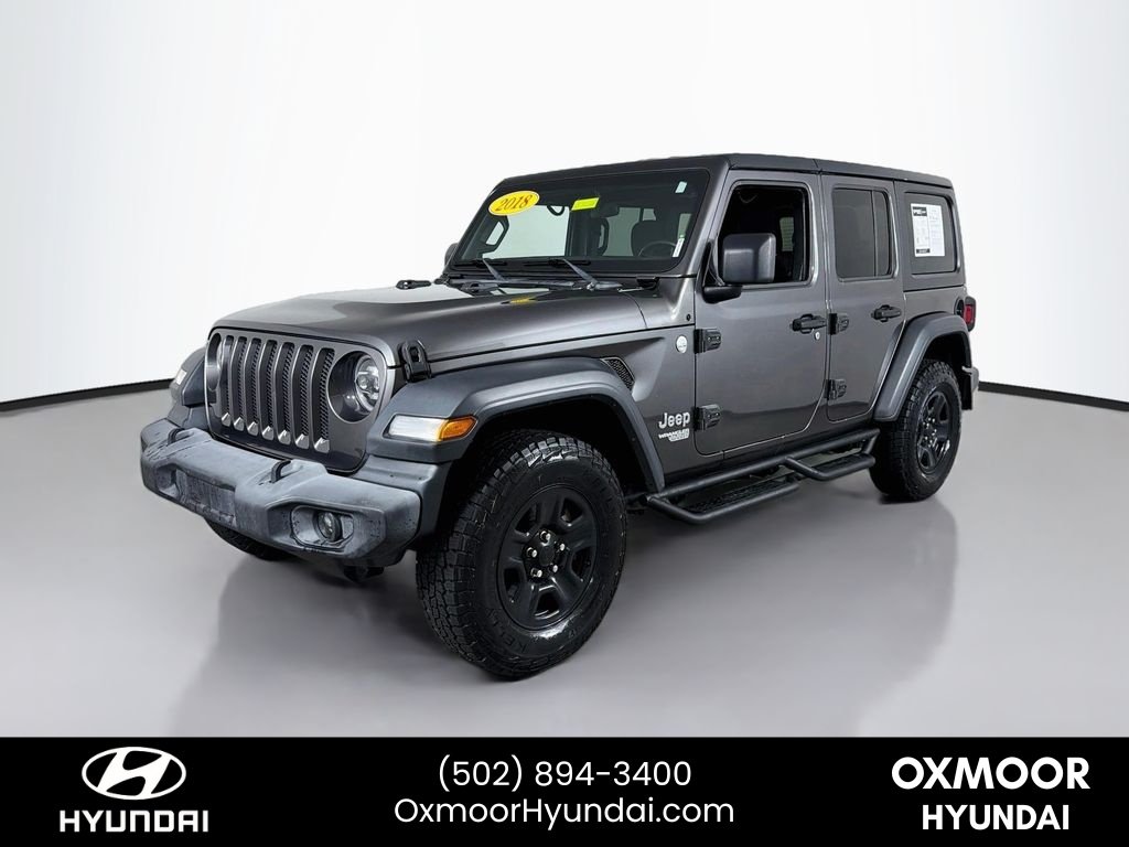 Used 2018 Granite Crystal Metallic Clearcoat Jeep Sport image 3