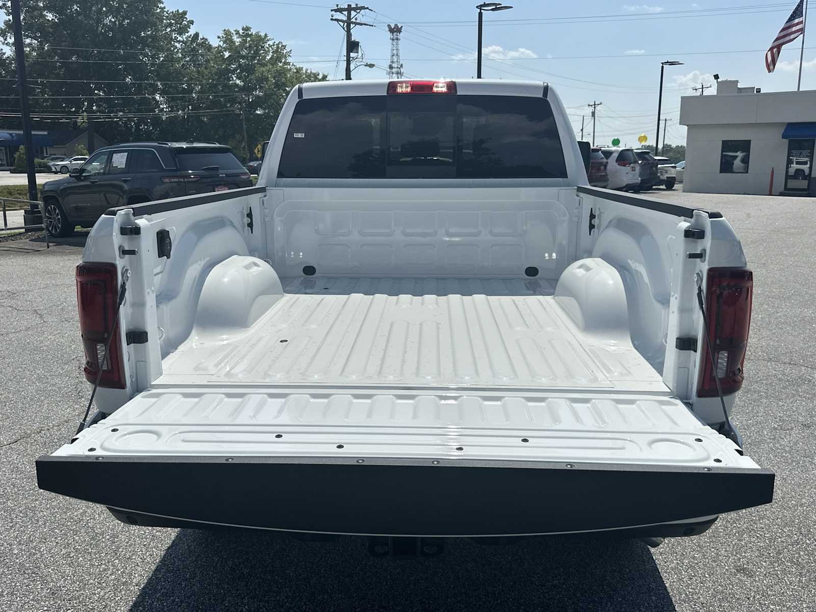 New 2026 Bright White Clear-Coat Exterior Paint RAM Laramie image 18