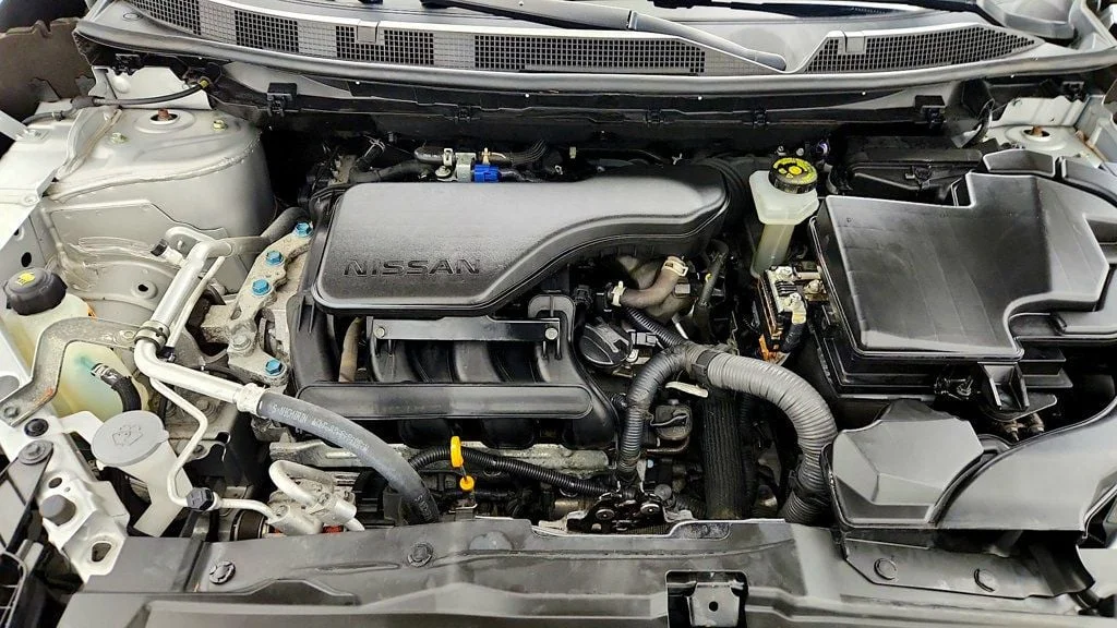 Used 2020 Brilliant Silver Metallic Nissan FWD SV image 25
