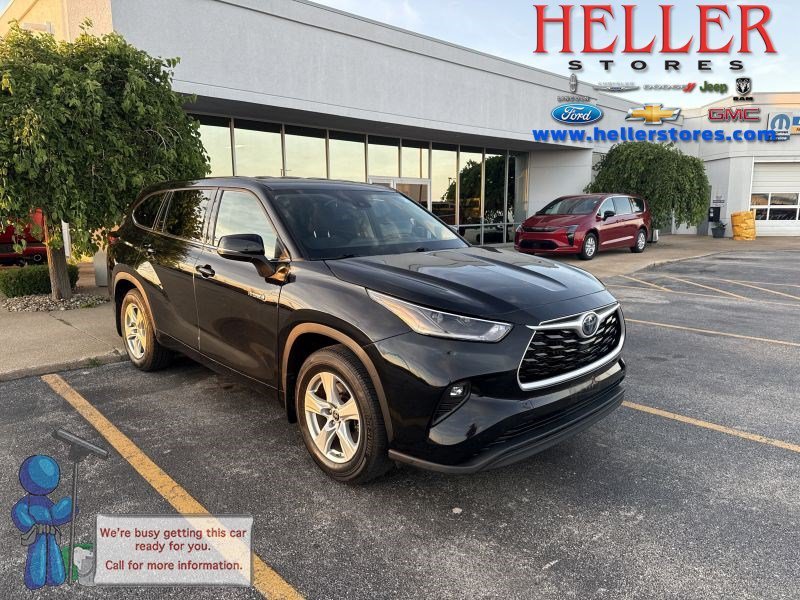 Used 2021 Midnight Black Metallic Toyota LE image 1