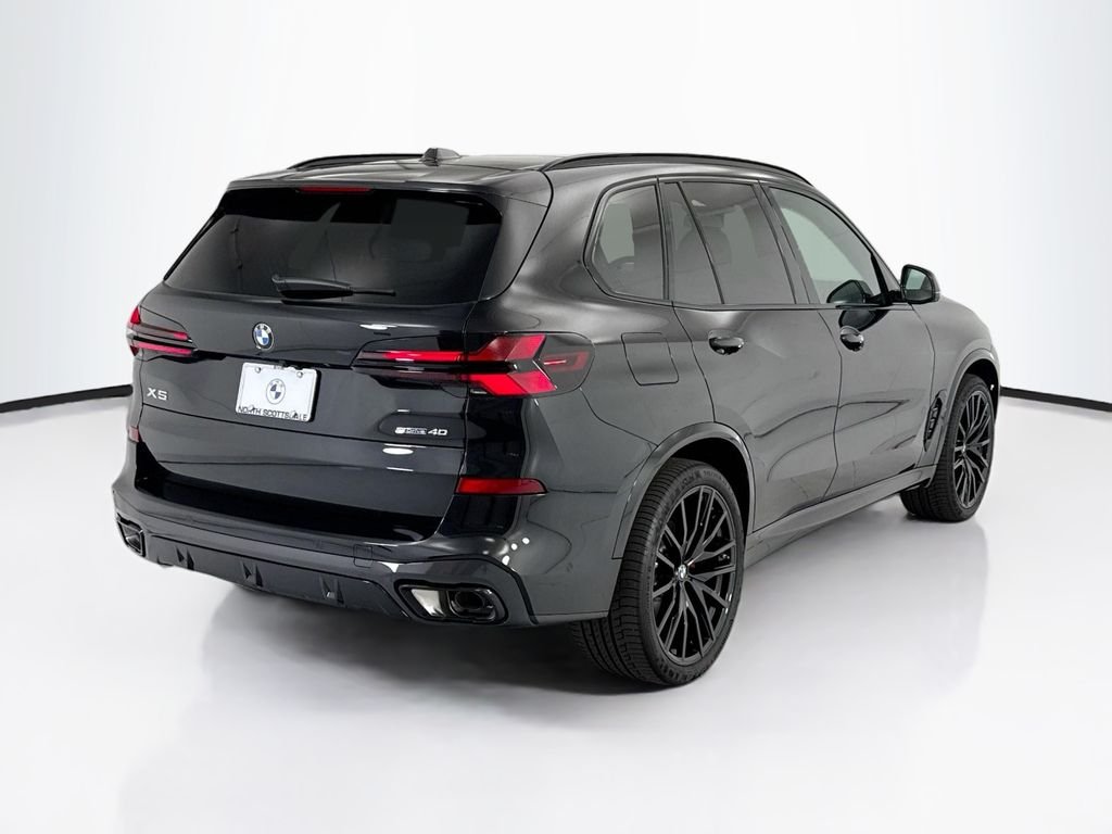 New 2026 Black Sapphire Metallic BMW sDrive40i image 5