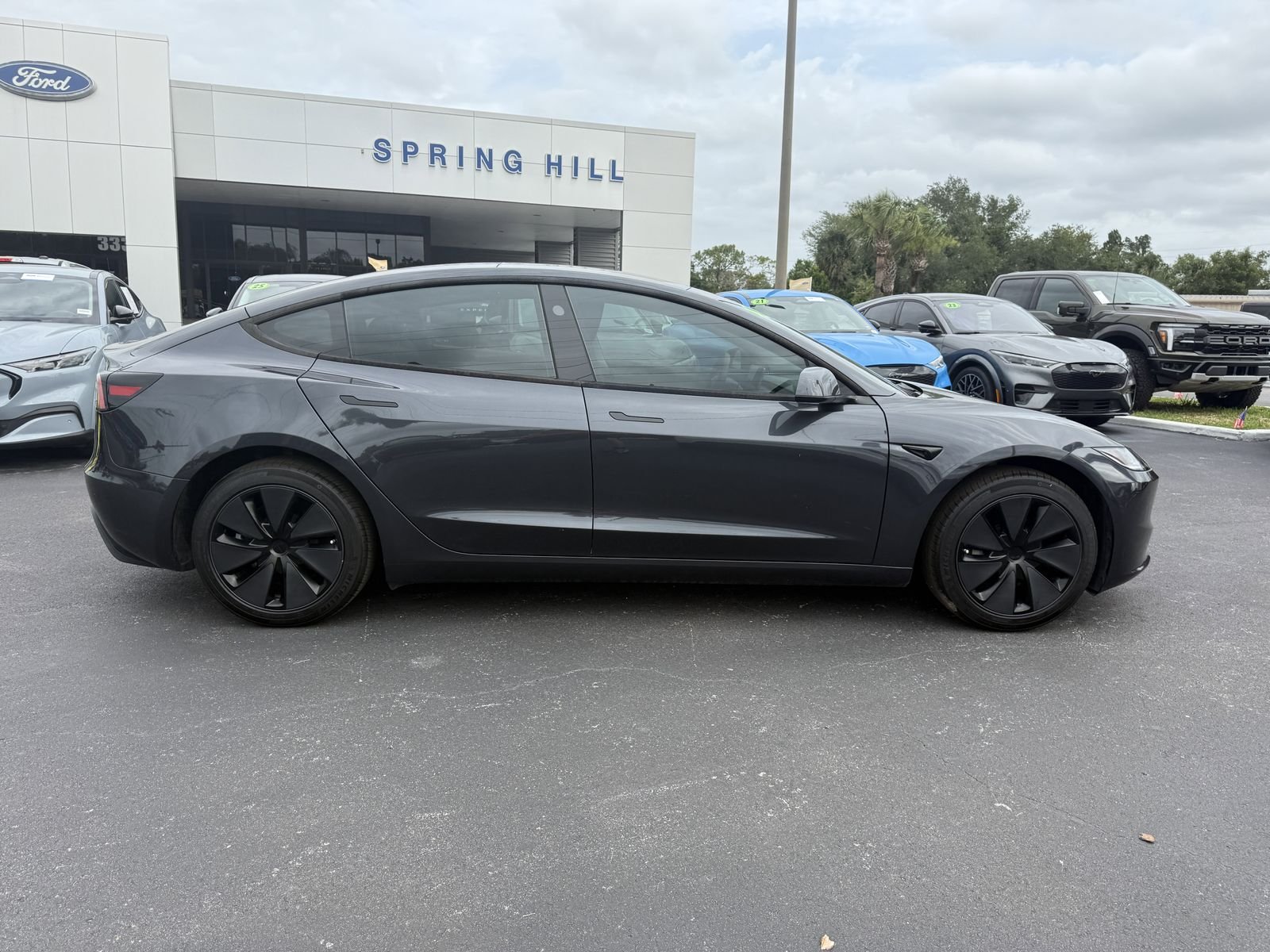 Used 2025 Stealth Gray Tesla Long Range image 3