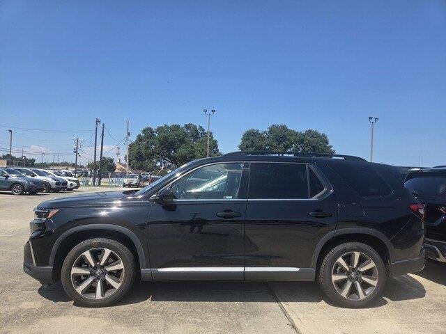 Used 2024 Crystal Black Pearl Honda Touring image 2