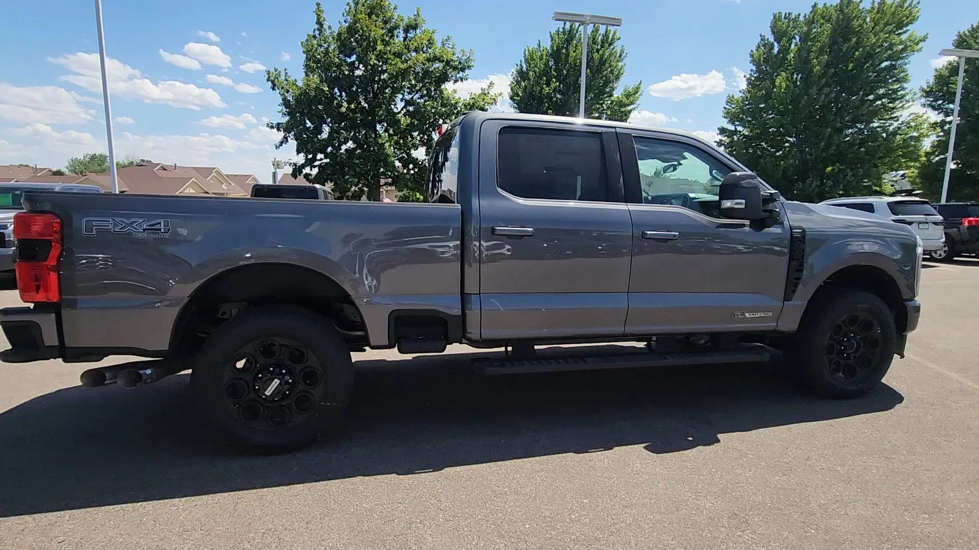 New 2026 Carbonized Gray Metallic Ford LARIAT image 11