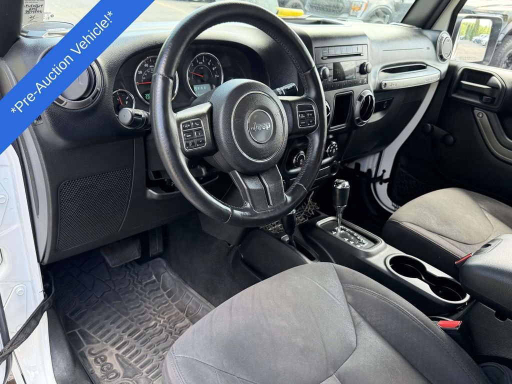 Used 2015 Jeep Wrangler Sport with VIN 1C4AJWAG6FL505614 for sale in Midlothian, VA
