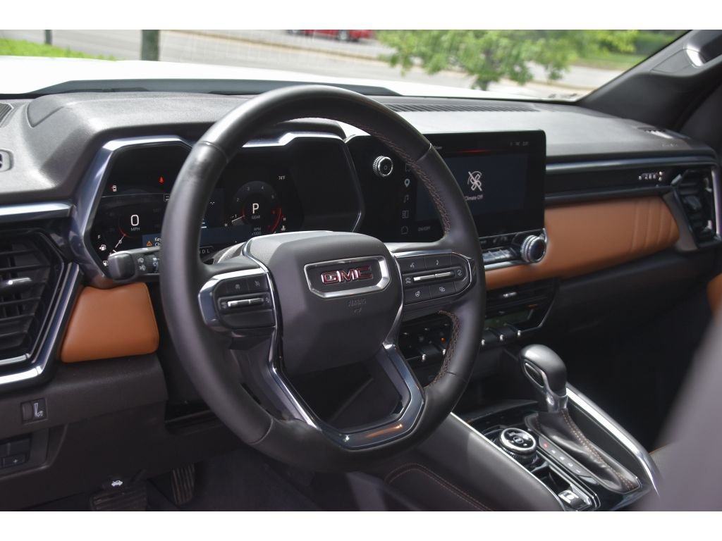 Used 2024 Summit White GMC 4WD AT4 image 12