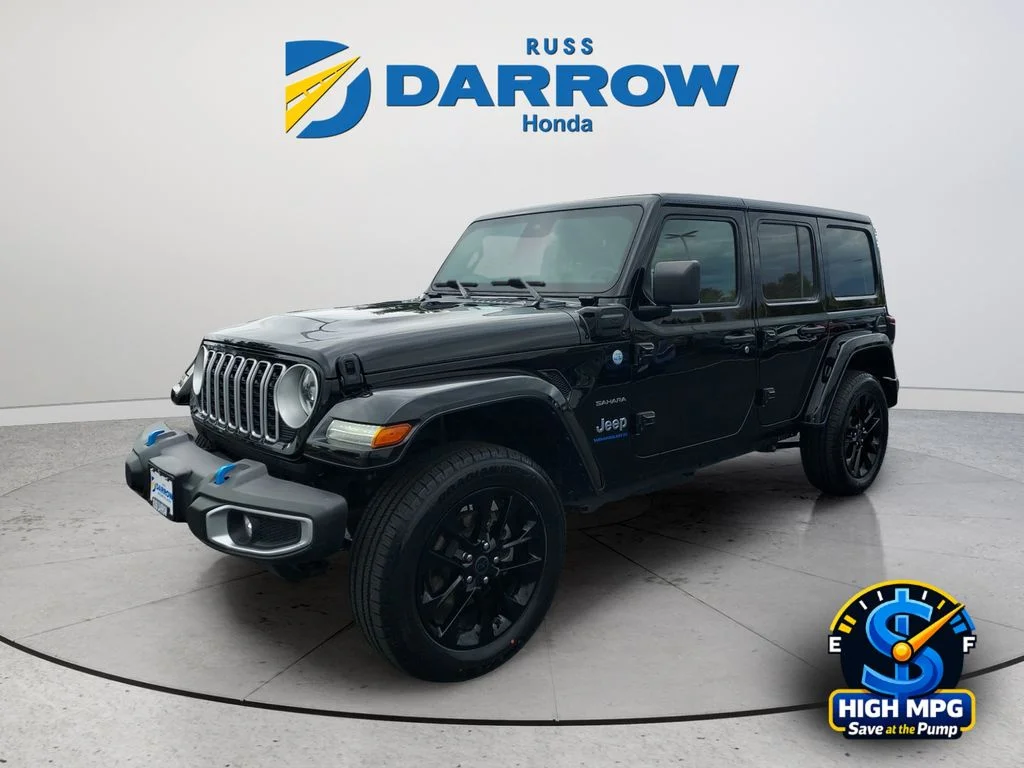 Used 2024 Black Jeep Sahara 4xe image 1