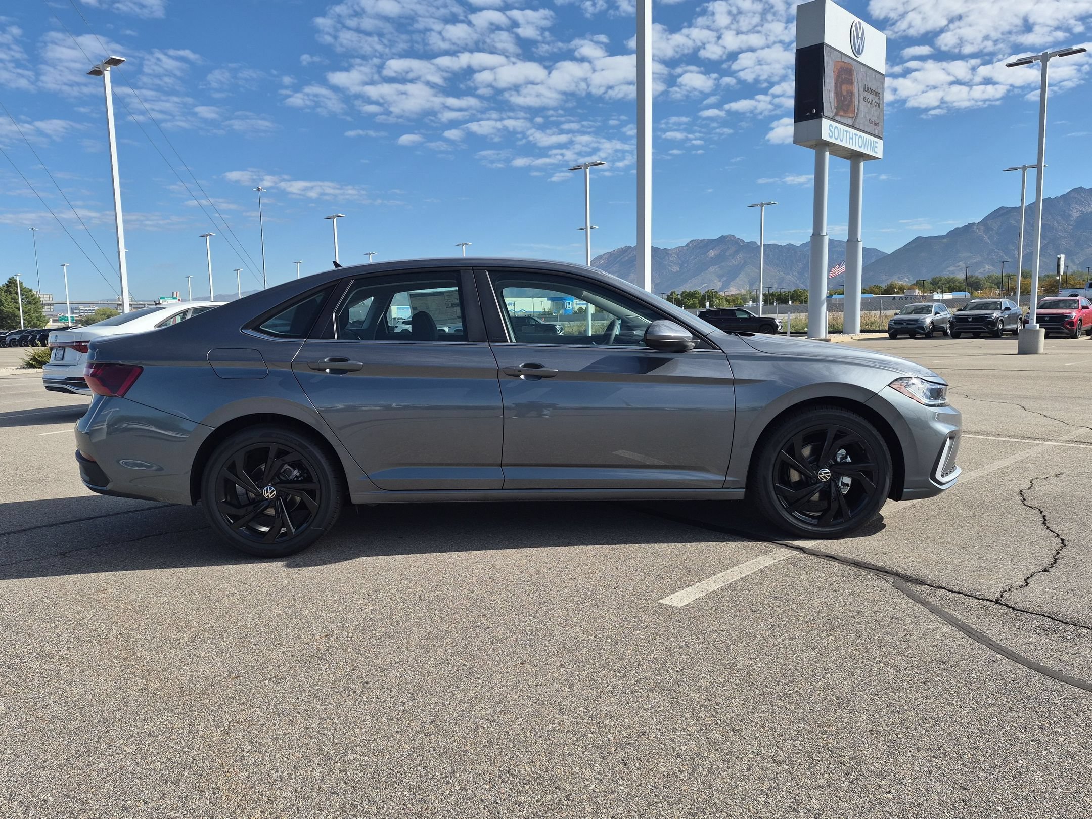New 2027 Platinum Gray Metallic Volkswagen SE image 2