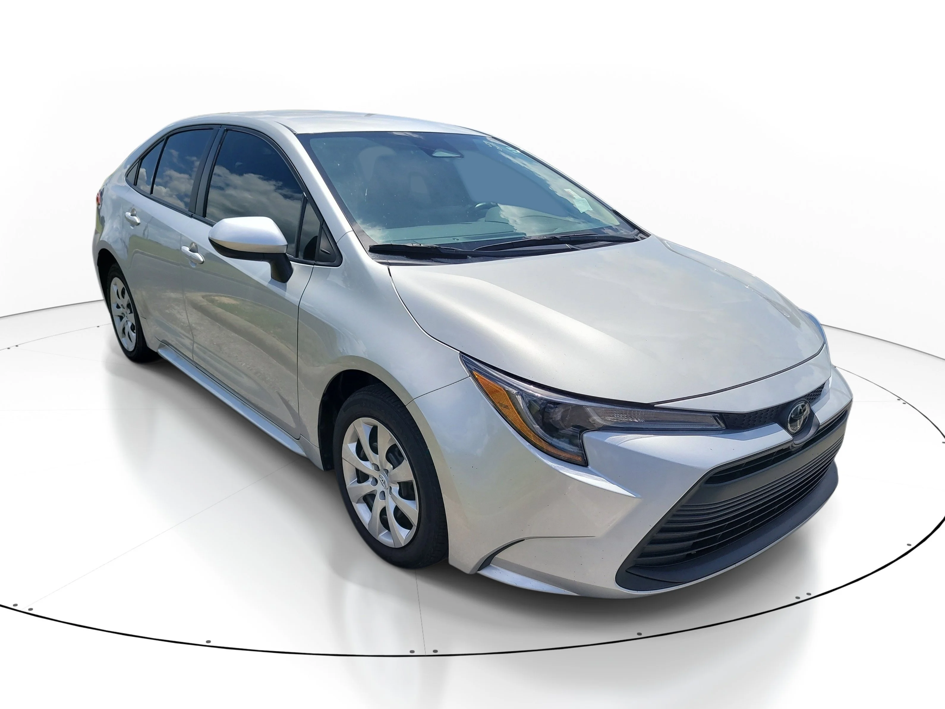 Used 2024 Classic Silver Metallic Toyota LE image 1