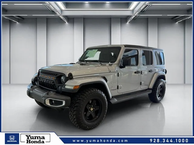 Used 2018 Silver Jeep Unlimited Sahara image 1