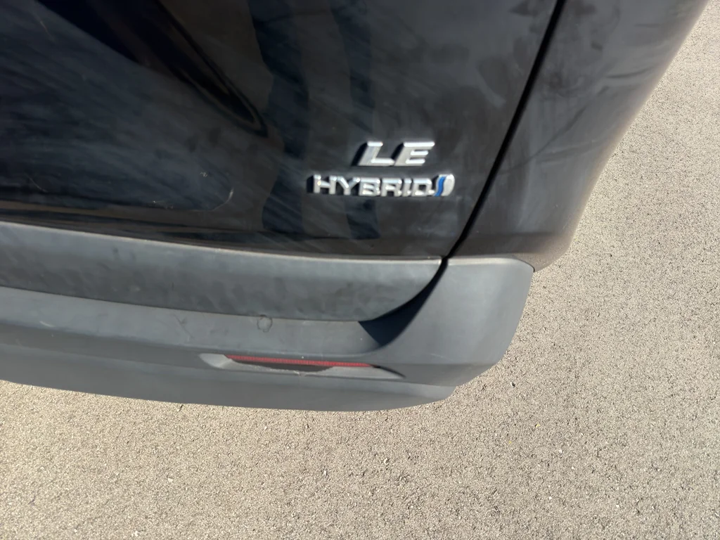Used 2024 Midnight Black Metallic Toyota Hybrid LE image 5
