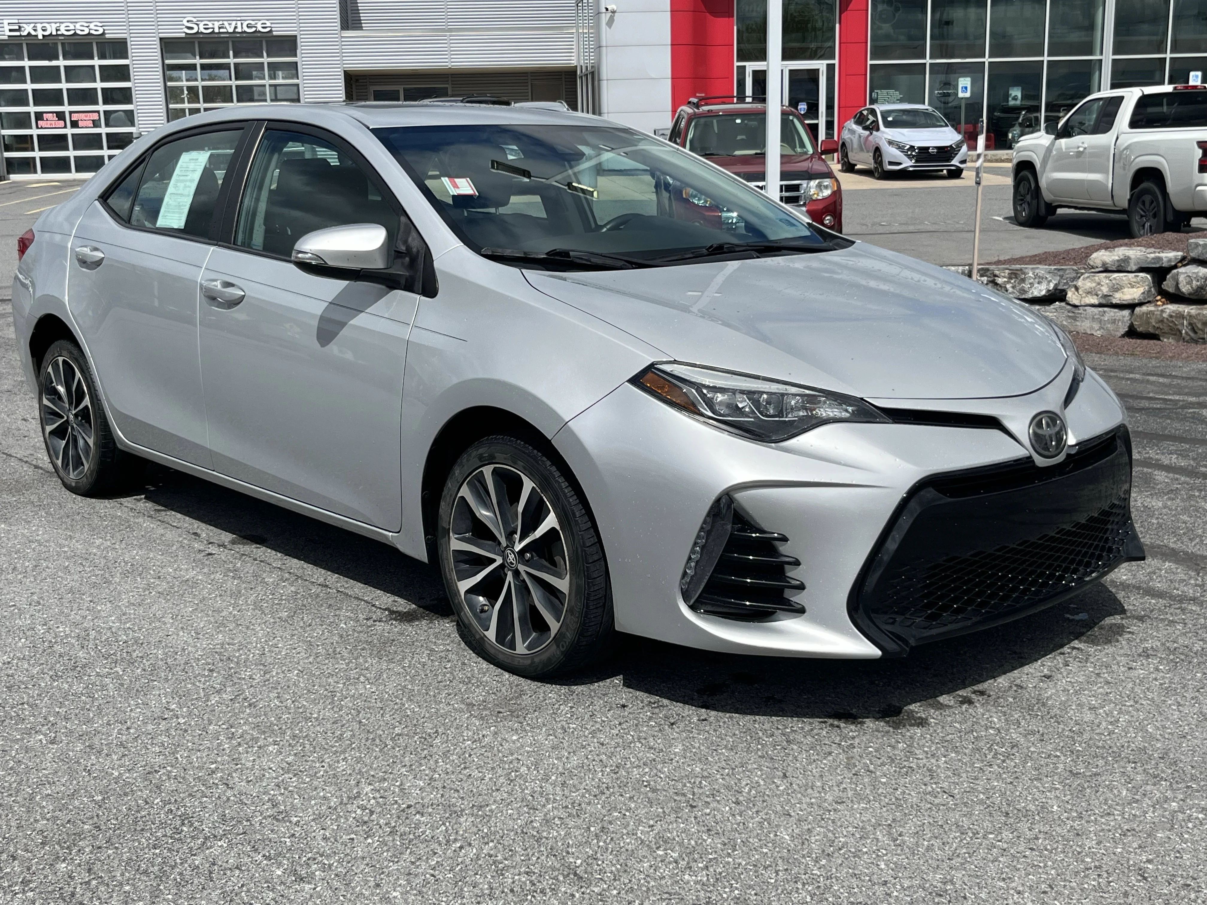 Used 2018 Classic Silver Metallic Toyota SE image 1