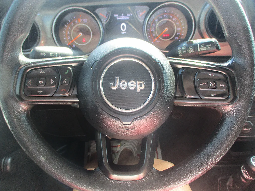 Used 2019 Granite Crystal Metallic Clear Coat Jeep Sport image 9
