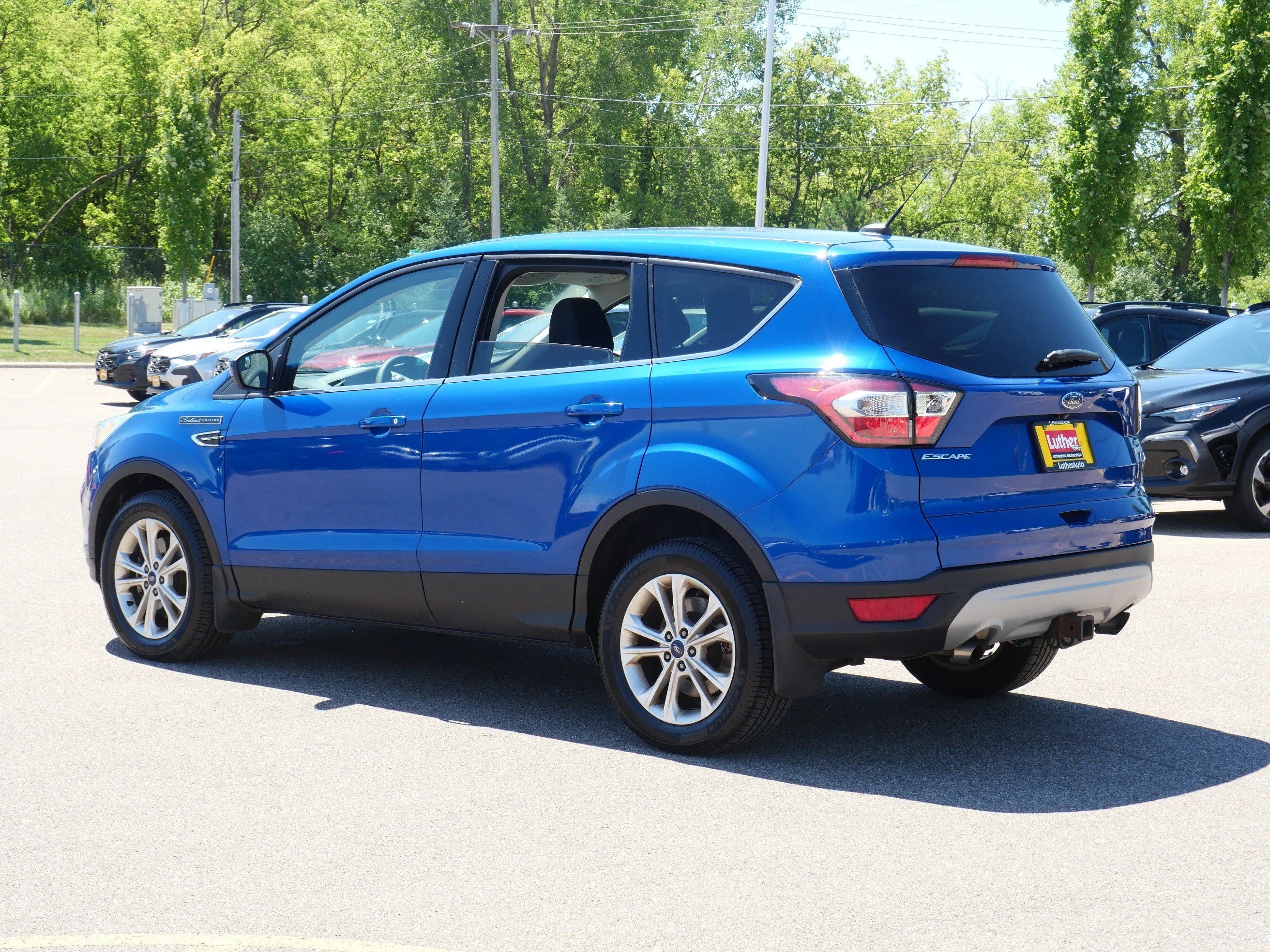 Used 2017 Lightning Blue Metallic Ford SE image 5