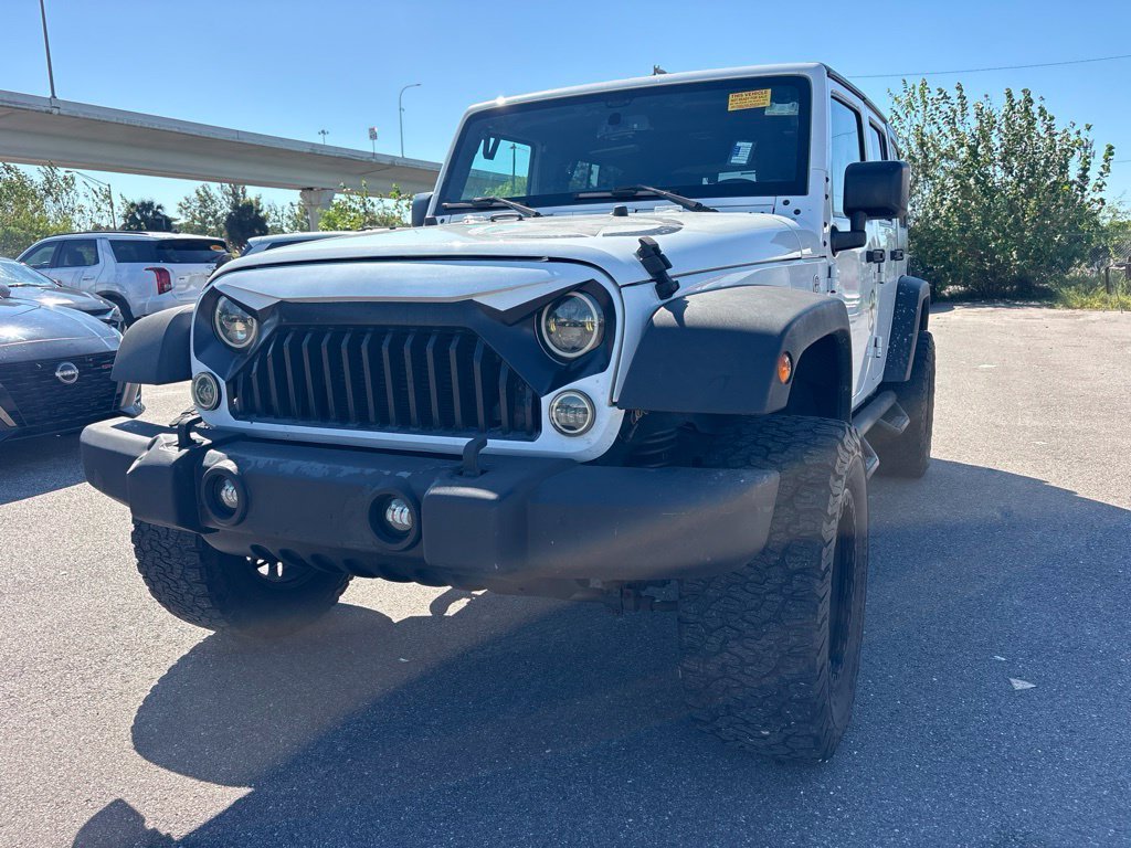 Used 2016 White Jeep Unlimited Sport image 7