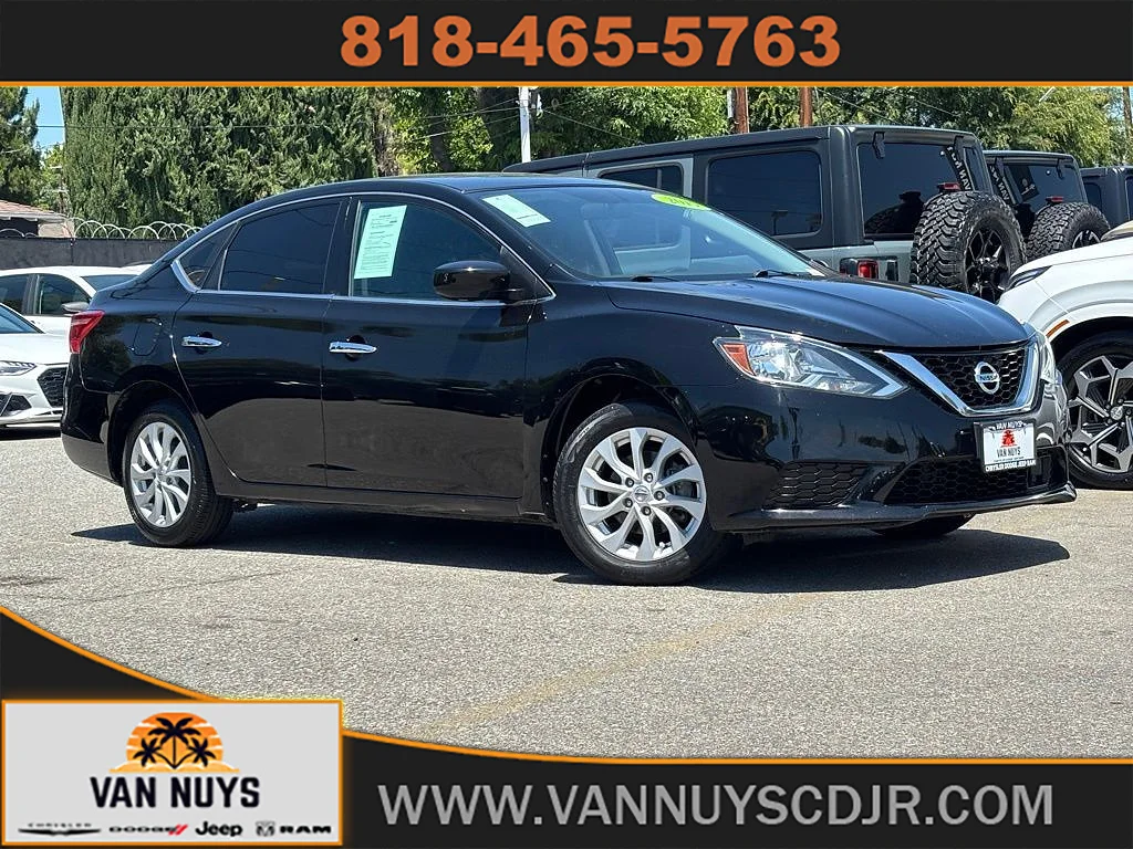 Used 2019 Super Black Nissan SV image 1