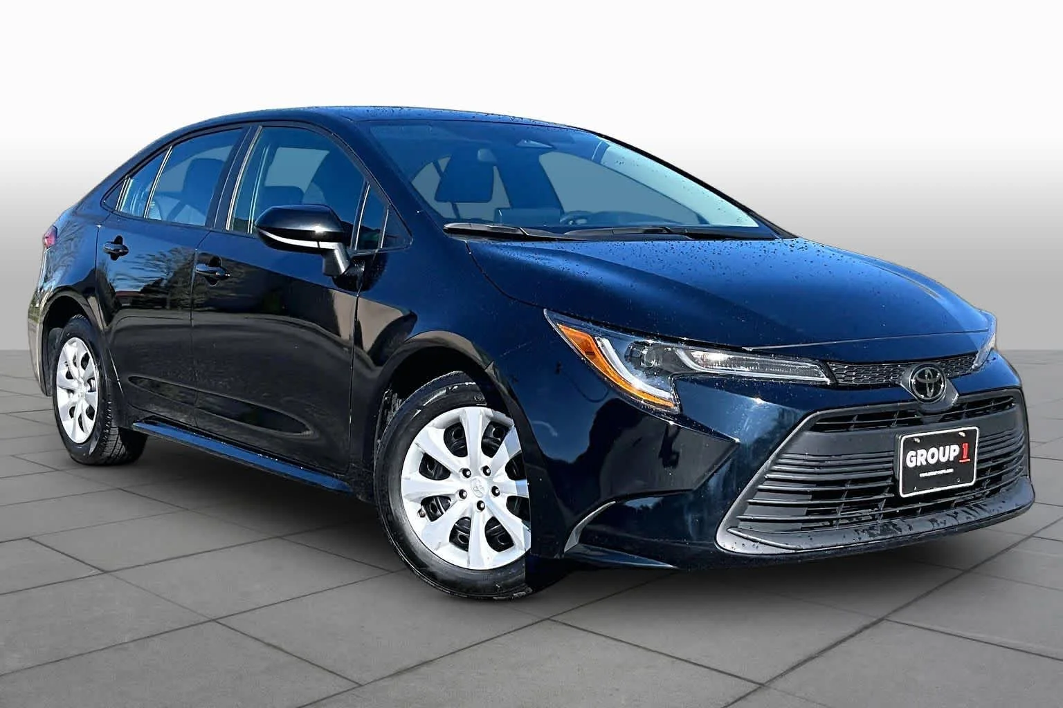Used 2024 Midnight Black Metallic Toyota LE image 3
