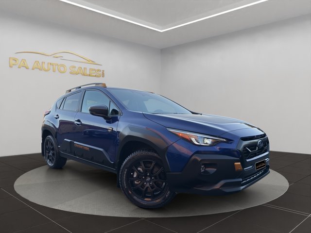 Used 2024 Sapphire Blue Pearl Subaru Wilderness image 1