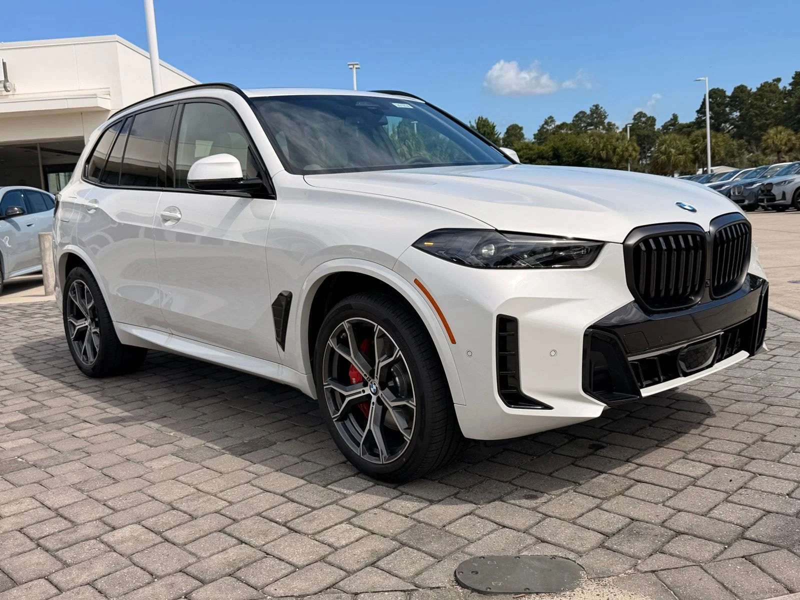 New 2026 Mineral White Metallic BMW xDrive40i image 7