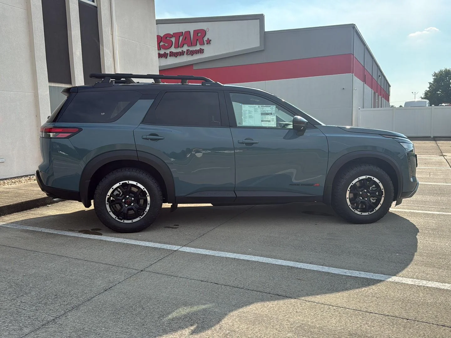 New 2026 Baltic Teal/Super Black Metallic Nissan Rock Creek image 8