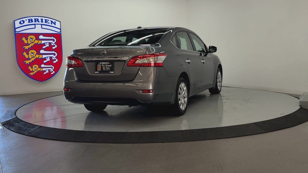 Used 2015 Gun Metallic Nissan SV image 5
