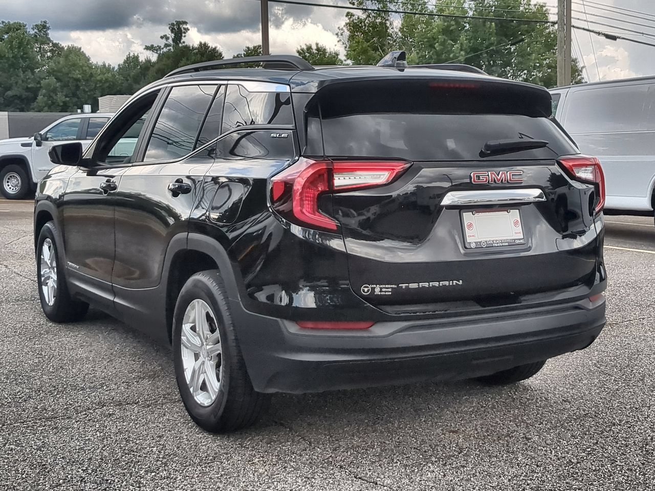 Used 2023 Ebony Twilight Metallic GMC SLE image 6