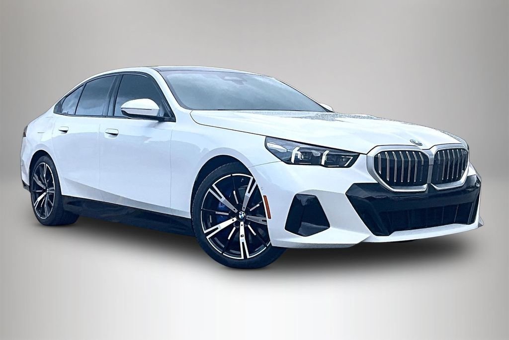 Used 2026 White BMW 550e xDrive image 1