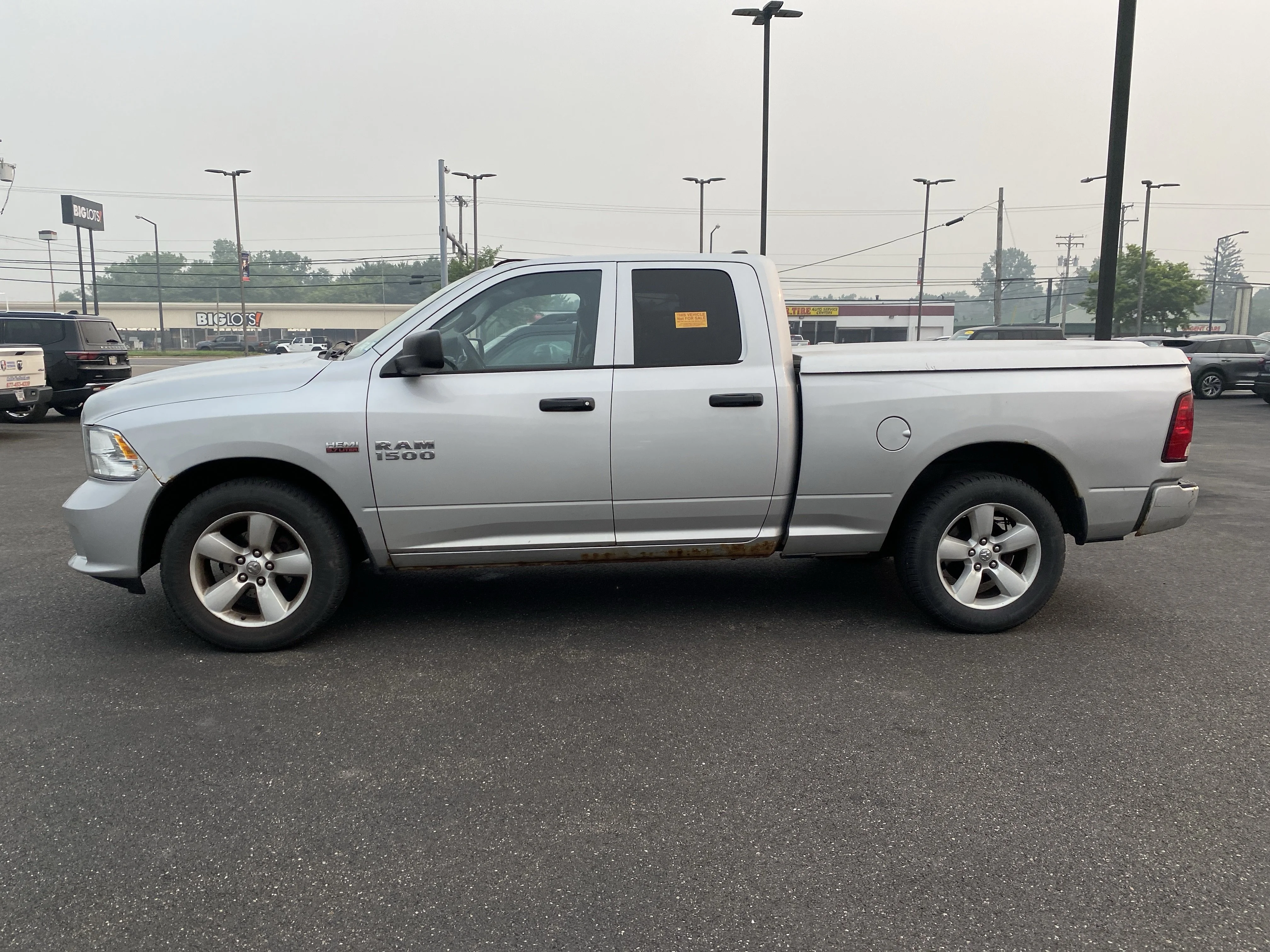 Used 2014 Bright Silver Metallic Clearcoat Ram  image 4