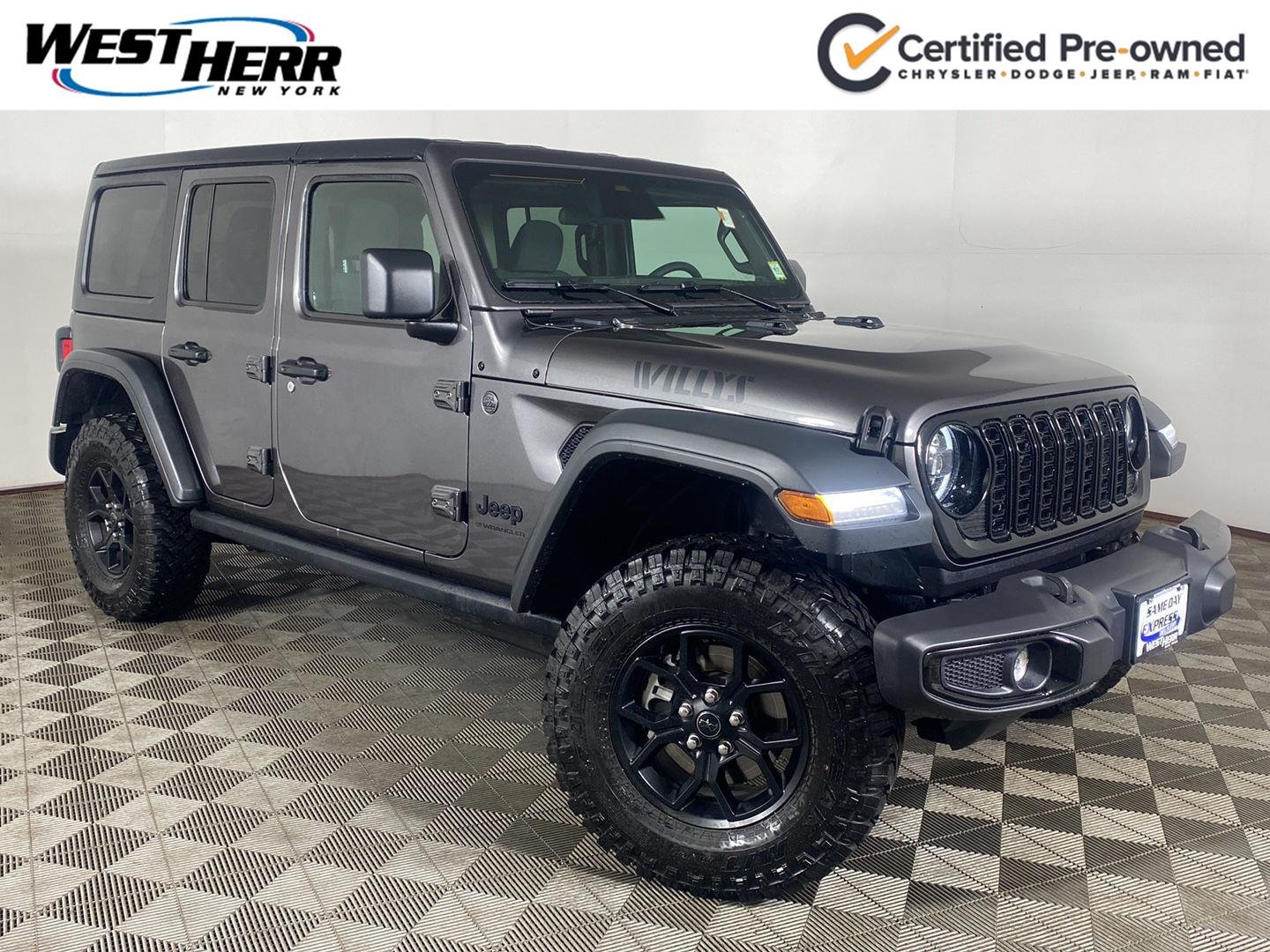 Used 2026 Granite Crystal Metallic Clear Jeep 4-Door Willys 4x4 image 1