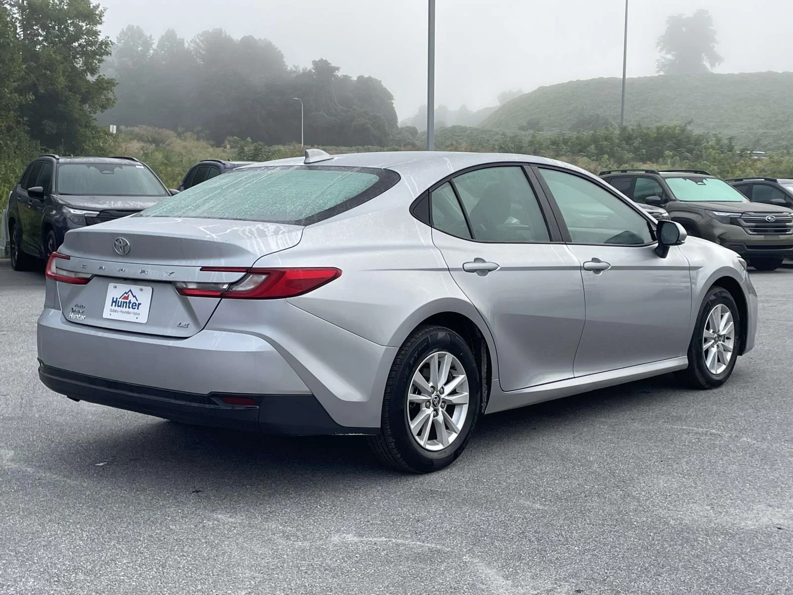 Used 2025 Celestial Silver Metallic Toyota LE image 28