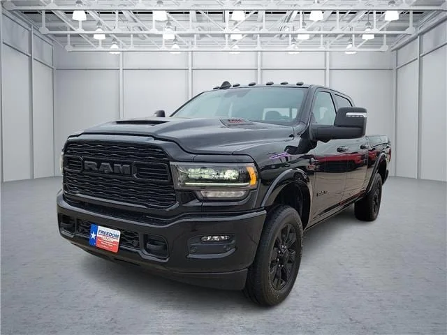 Used 2024 Diamond Black Crystal Pearlcoat RAM Limited 4x4 Crew Cab 6.3 ft. box 149.5 in. WB SRW image 1