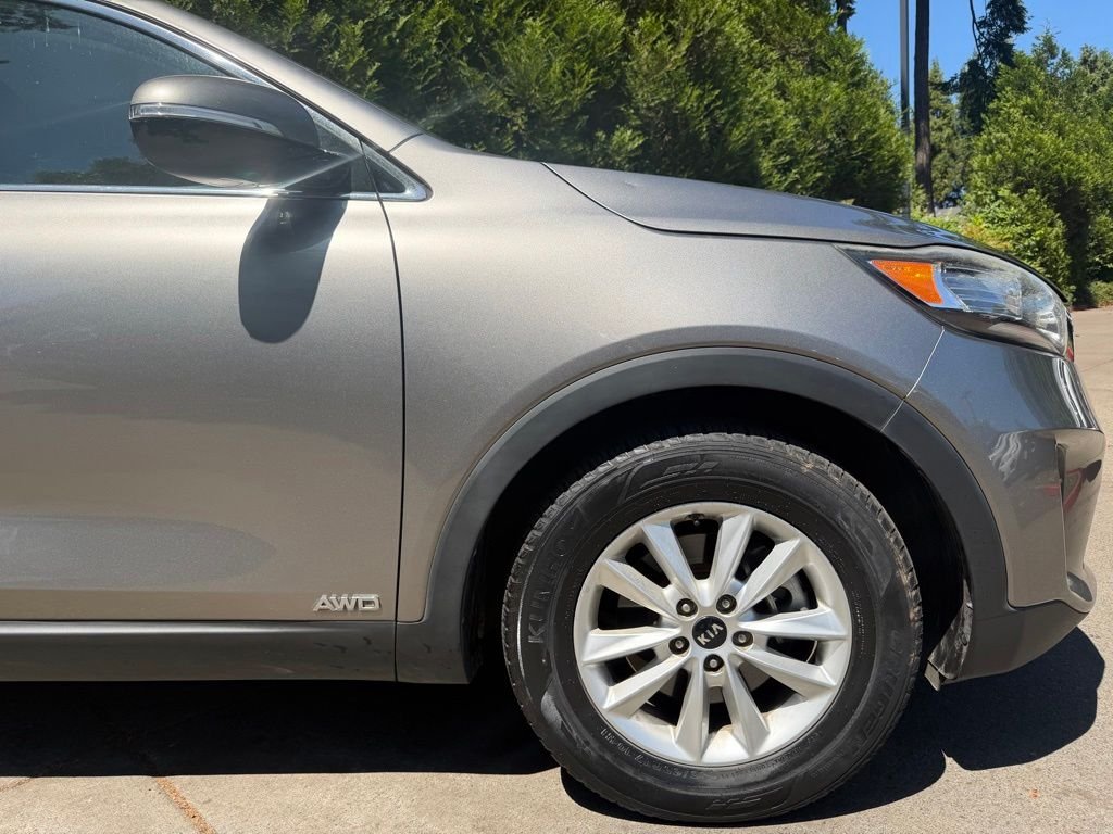 Used 2019 Titanium Silver Kia LX image 1