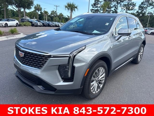 Used 2024 Silver Cadillac Premium Luxury image 1