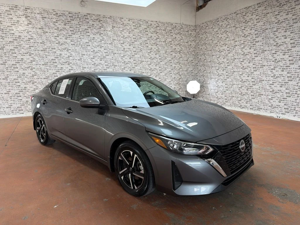 Used 2024 Gun Metallic Nissan SV image 1
