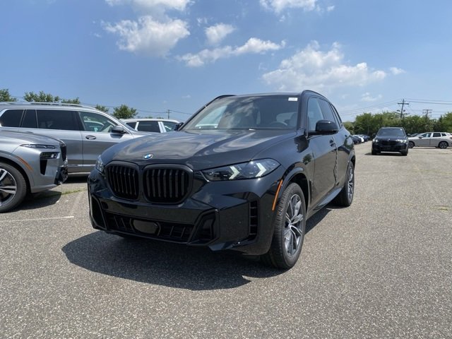 Certified Used 2026 Black Sapphire Metallic BMW xDrive40i image 1