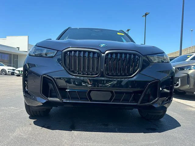 New 2026 Carbon Black Metallic BMW xDrive50e image 2