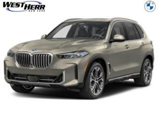New 2026 Manhattan Green Metallic BMW xDrive50e image 1