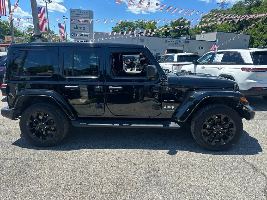 Used 2022 Black Jeep Unlimited Sahara 4xe image 4