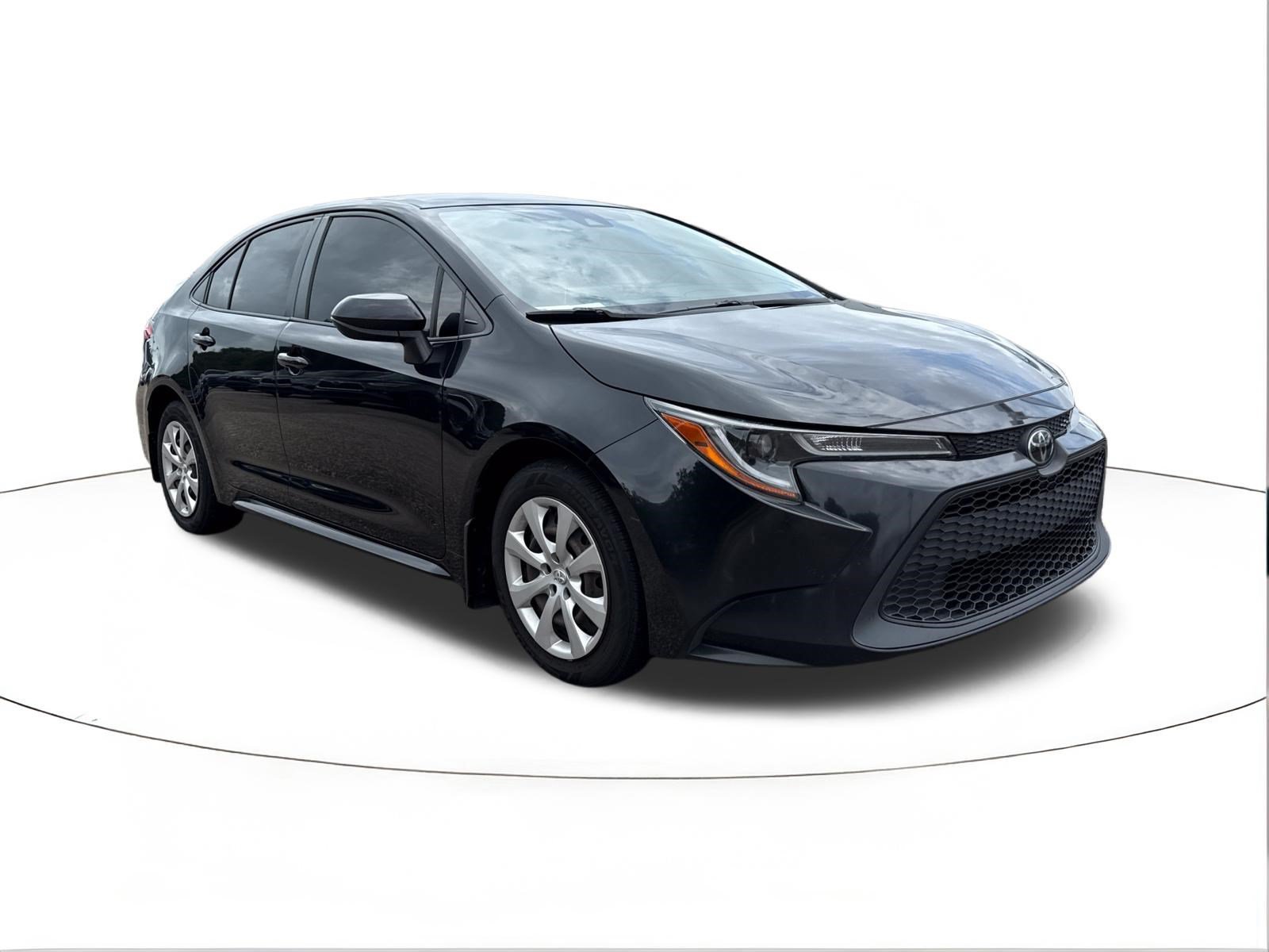 Used 2020 Black Sand Pearl Toyota LE image 1