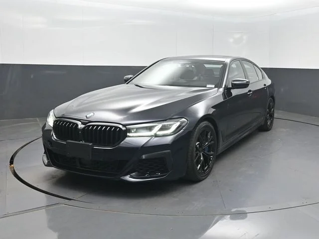Used 2021 Black BMW M550i xDrive image 2