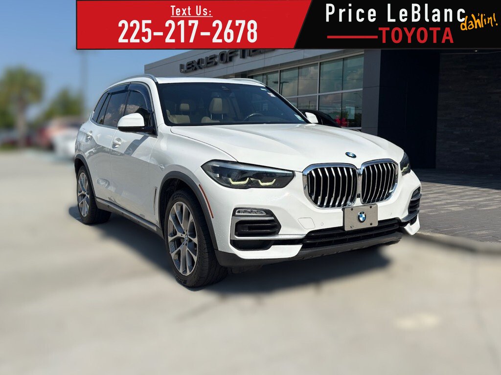 Used 2019 WHITE BMW xDrive40i image 1