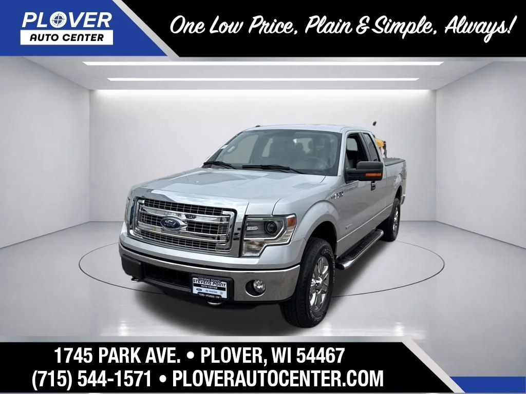 Used 2014 Ingot Silver Metallic Ford XLT image 1