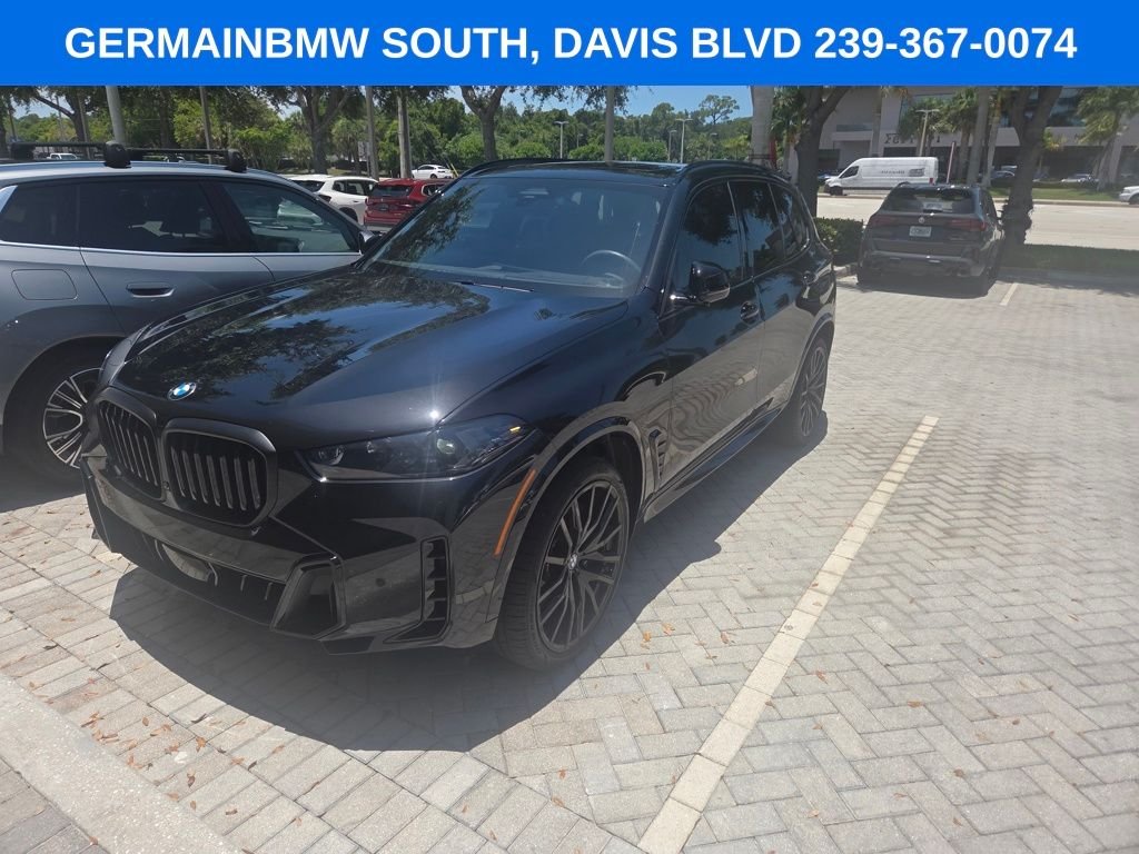 Certified Used 2026 Black Sapphire Metallic BMW sDrive40i image 2
