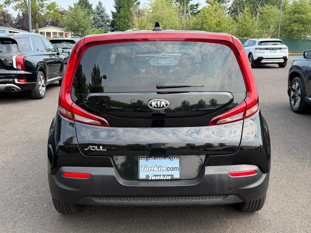 Used 2021 Cherry Black Kia LX image 6
