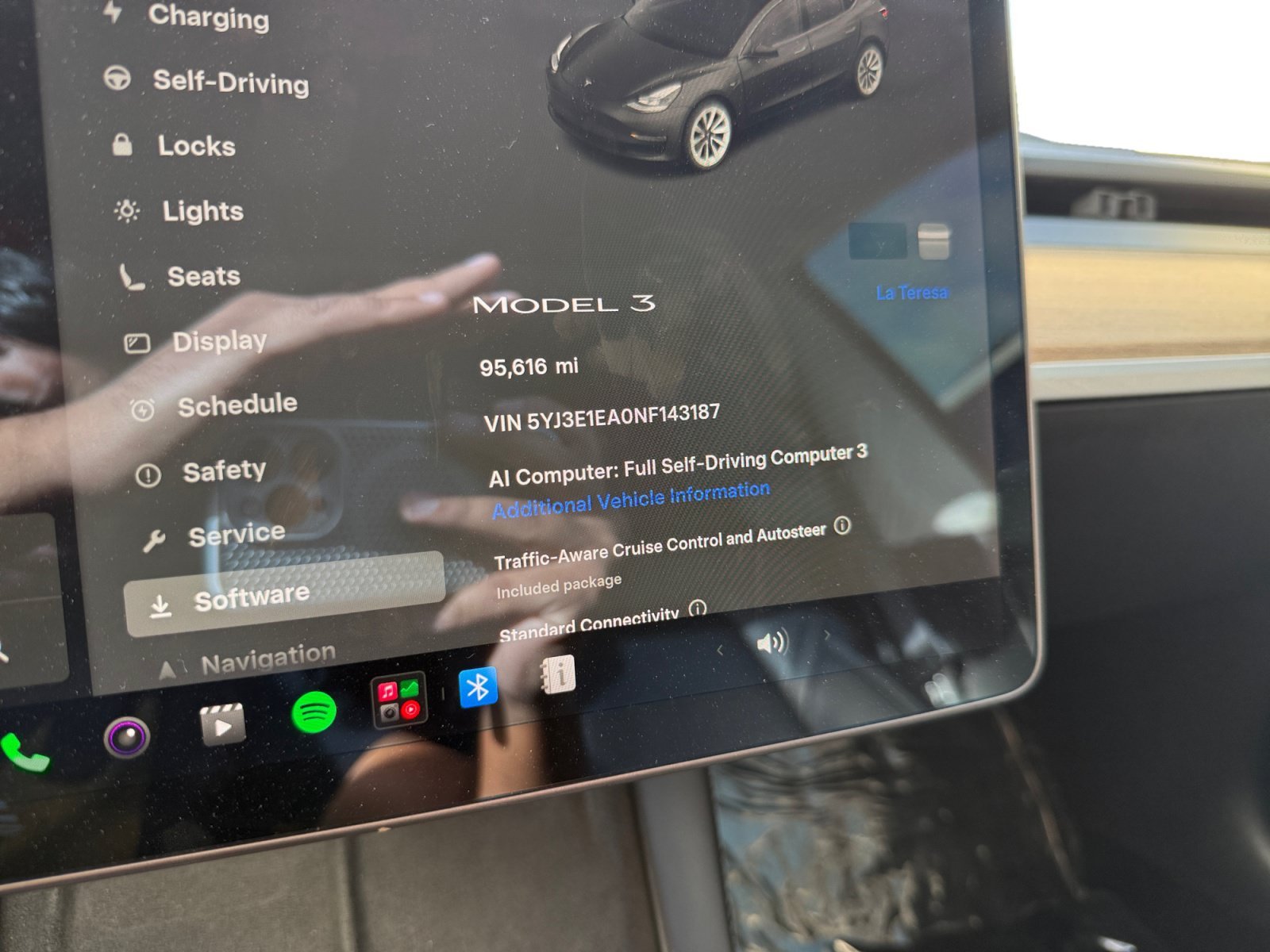 Used 2022 Solid Black Tesla Base image 11