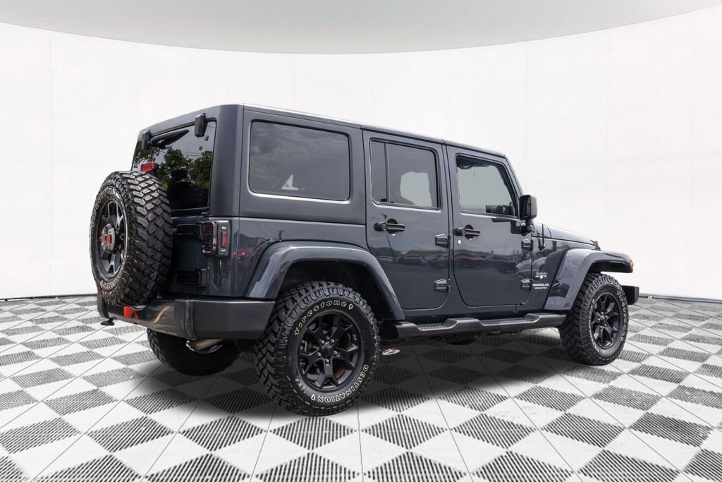 Used 2017 Black Jeep Unlimited Sahara image 10