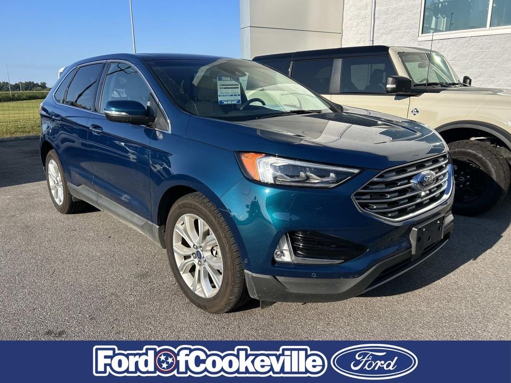Used 2020 Green Metallic Ford Titanium image 1