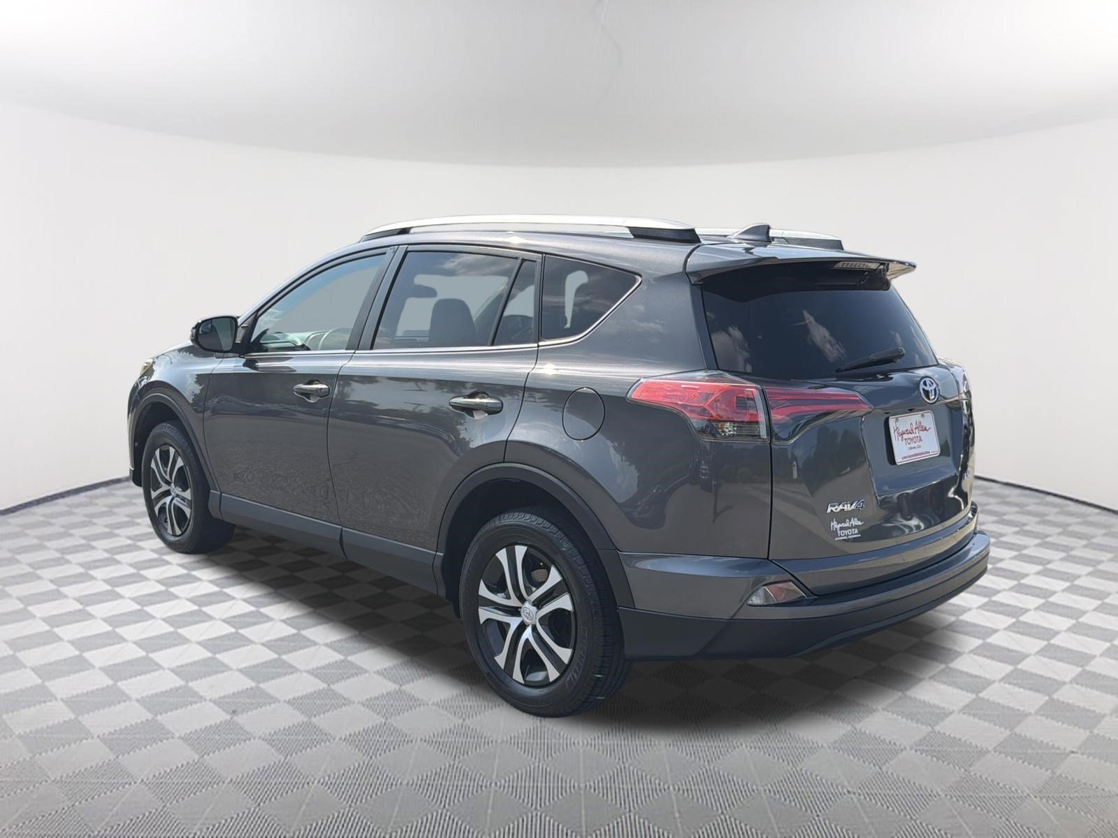 Used 2016 Magnetic Gray Metallic Toyota LE image 13