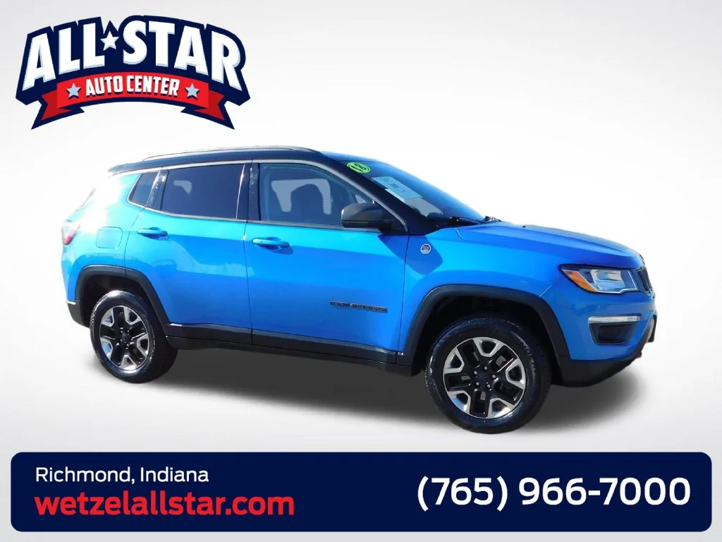 Used 2018 Laser Blue Jeep Trailhawk image 1